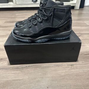 Air Jordan 11 Cap and Gowns